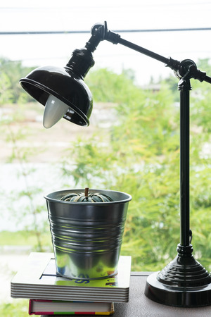 black lamp on wooden deskの写真素材