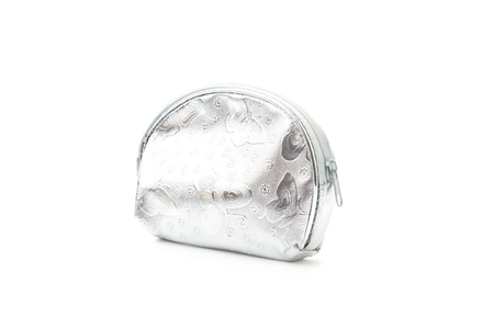 silver coin bag isolated on white backgroundの写真素材