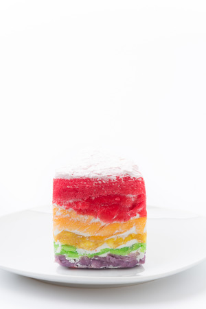 Rainbow crepe cake isolated on white backgroundの写真素材