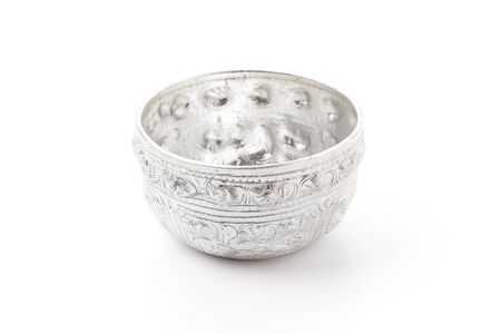 Old silver bowl isolated on white backgroundの写真素材