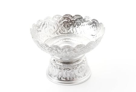 Old silver bowl isolated on white backgroundの写真素材