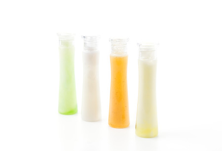 Cosmetics bottles isolated on white backgroundの写真素材
