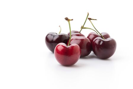 cherry berries isolated on white backgroundの写真素材