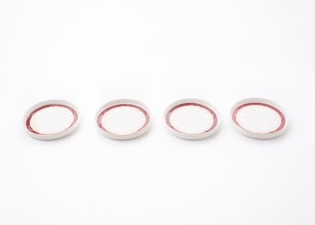 saucers isolated on white backgroundの写真素材