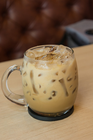 a cup of coffee on wood tableの写真素材