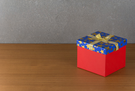 gift box on wood tableの写真素材