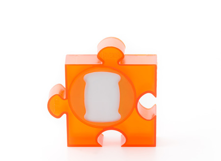orange jigsaw picture frame on whiteの写真素材