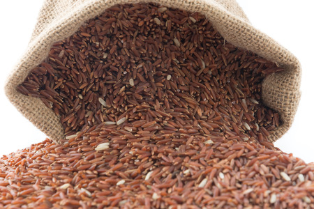 pound red rice on white backgroundの写真素材