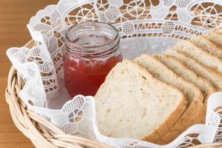 whole wheat bread with strawberry jamの写真素材