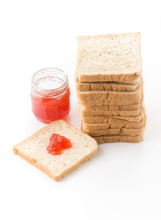 whole wheat bread with strawberry jamの写真素材
