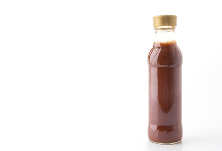 barbecue sauce bottle on white backgroundの写真素材