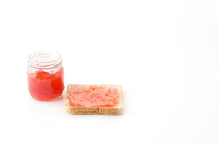 whole wheat bread with strawberry jamの写真素材
