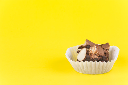 brownie cake on yellow backgroundの写真素材