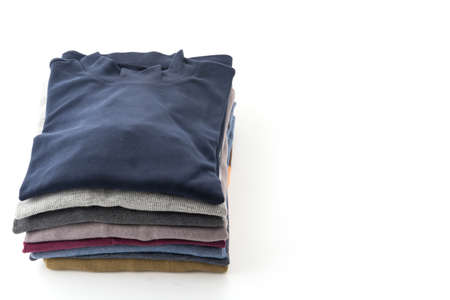 Stack of clothes isolated on white backgroundの写真素材