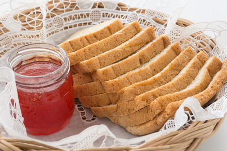 whole wheat breads with strawberry jamの写真素材