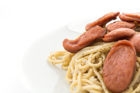 spaghetti cream sauce with sausageの写真素材