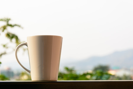 Morning cup of coffee on balconyの写真素材