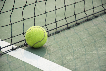 tennis ball on the courtの写真素材