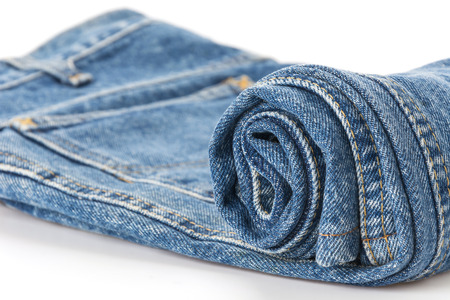 rolled blue jeans texture or detailの写真素材