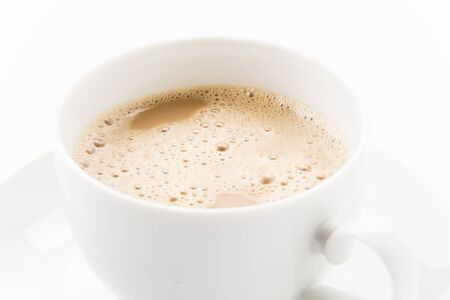 a cup of coffee on white