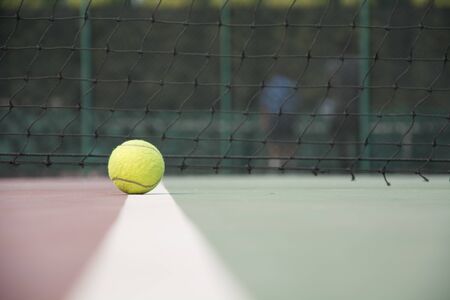 tennis ball on the courtの写真素材