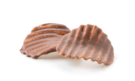 potato chip with chocolate on whiteの写真素材