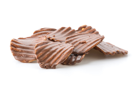 potato chip with chocolate on whiteの写真素材