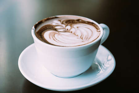 chocolate latte - soft focus with vintage film filterの写真素材