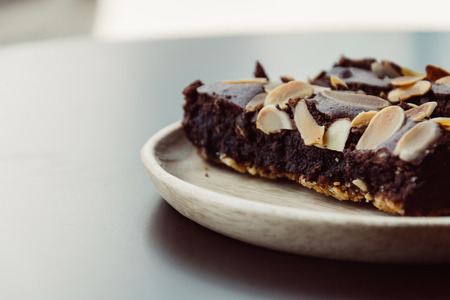 chocolate brownies on wood plateの写真素材