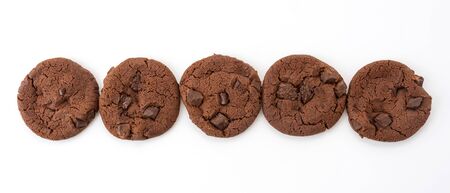 soft dark chocolate brownie cookies on whiteの写真素材