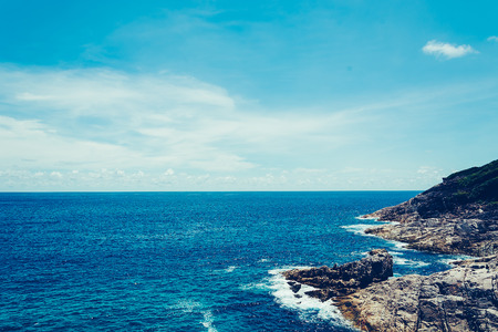 blue sky with sea and rock - film filterの写真素材
