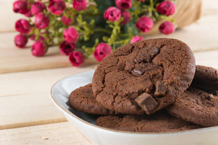 soft dark chocolate brownie cookies on woodの写真素材