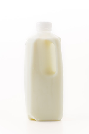milk bottle on white backgroundの写真素材