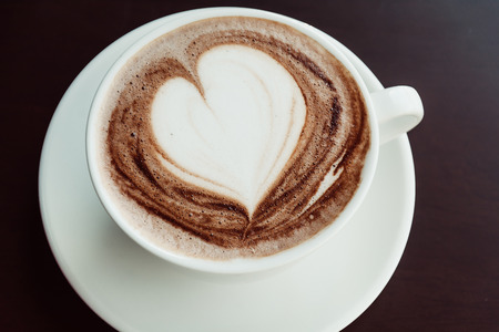 chocolate latte - soft focus with vintage film filterの写真素材