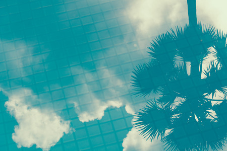 cloud shadow on pool water - soft focus with film filterの写真素材