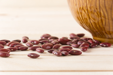red  beans on wood background