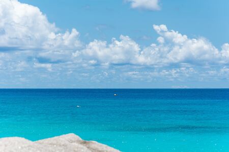 blue sky with sea and rockの写真素材