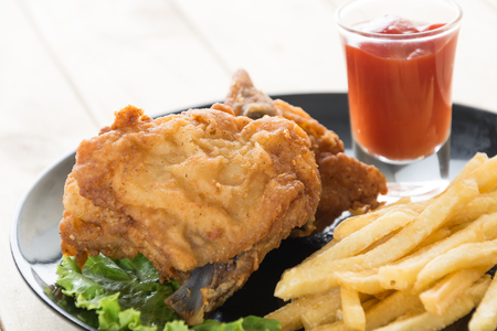 fried crispy chicken on woodの写真素材