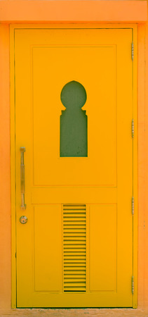yellow wood door morocco styleの写真素材