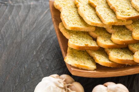 crispy bread garlic on wood background