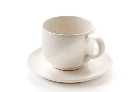 empty cup of coffee or mug on white backgroundの写真素材