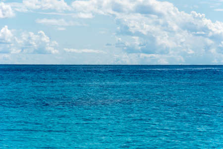 blue sky and water of oceanの写真素材