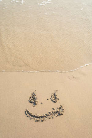smile face on the beachの写真素材