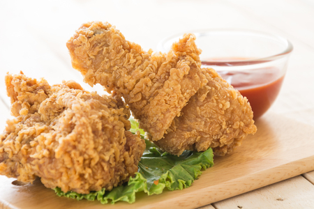fried crispy chicken on woodの写真素材