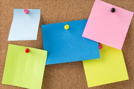 sticky note on cork board, empty space for text