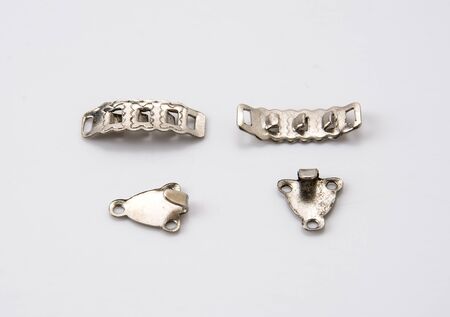 silver hook for cloth on white backgroundの写真素材