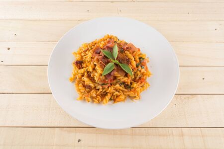 penne pasta on wood backgroundの写真素材