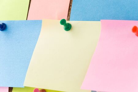 sticky note on cork board, empty space for textの写真素材