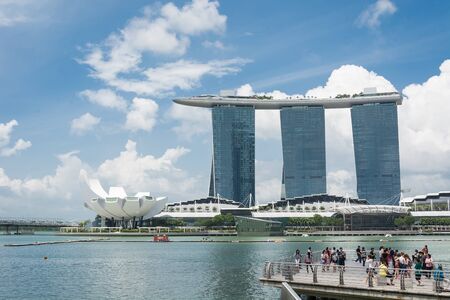 SINGAPORE-Jul 15, 2015: The Marina Bay Sands Resort in Singapore. The roofs of towers are decorated with a park in the form of a ship 340 m long and capacity up to 3,900 people.のeditorial素材