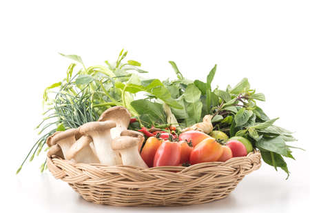 mix vegetable in woven basketの写真素材